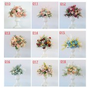 Flower Arrangements In Round Glass Vases