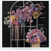 Large Flower Arrangement In Urn