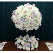 Flower Arranging Roses Into A Hydrangea