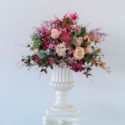 Stacked Flower Arrangement On Table