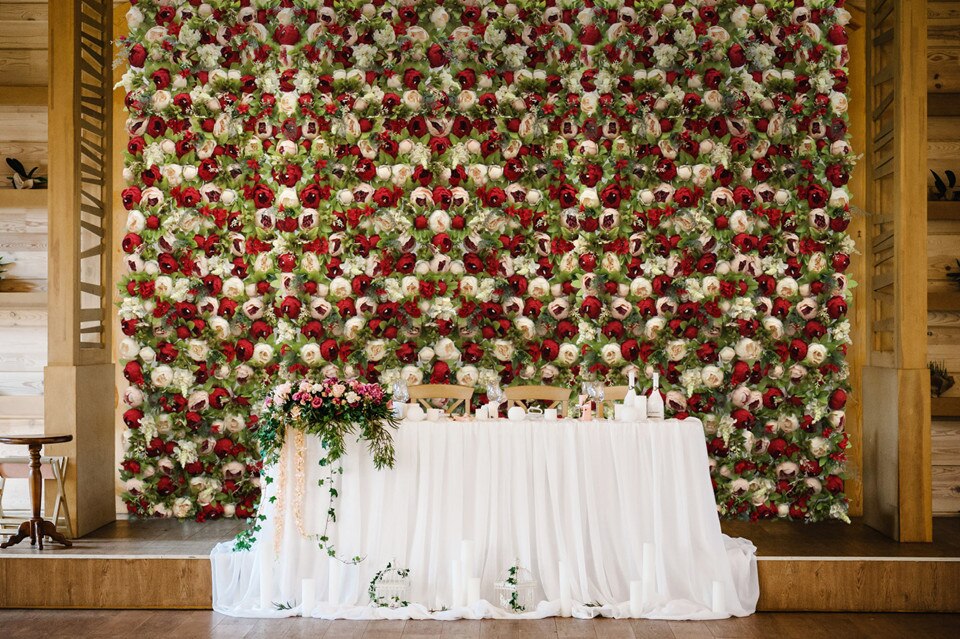 wooden triangle wedding arch