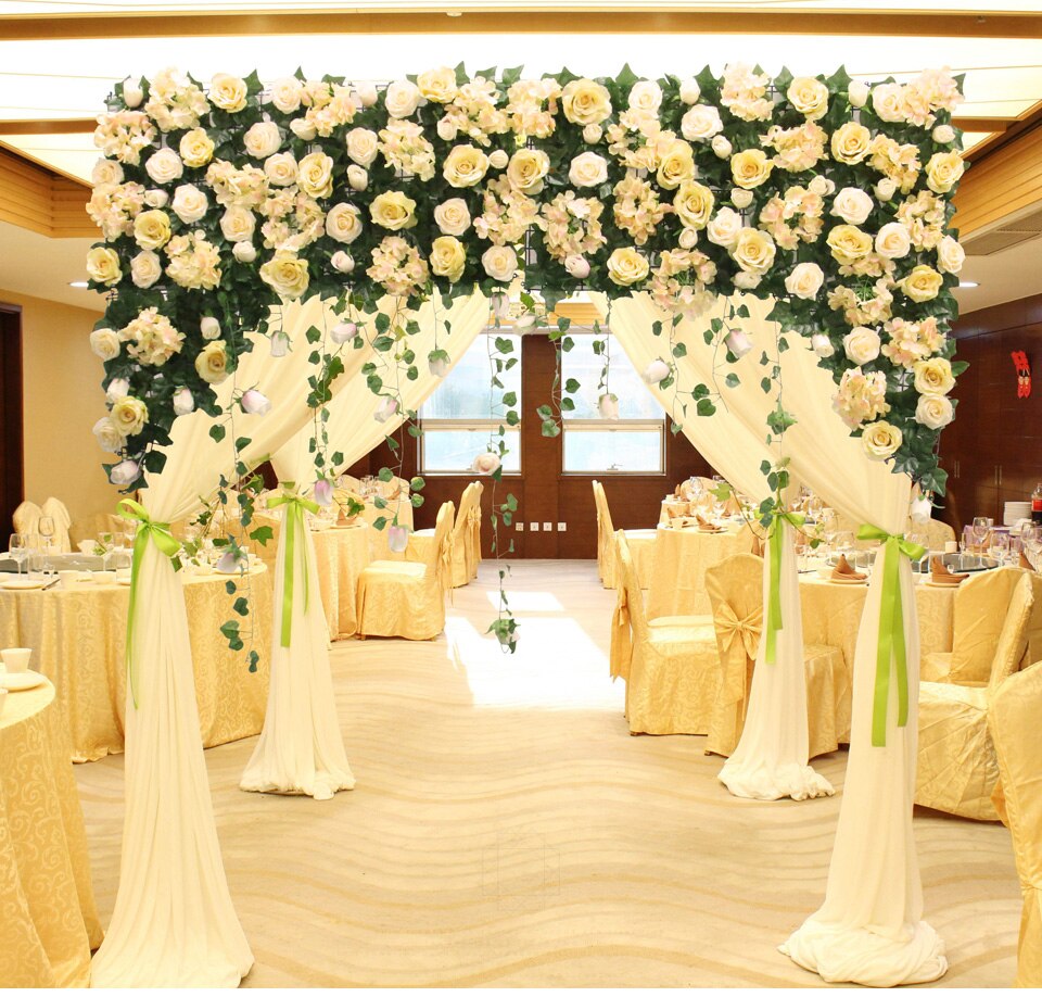 white flower arrangements in mason jars