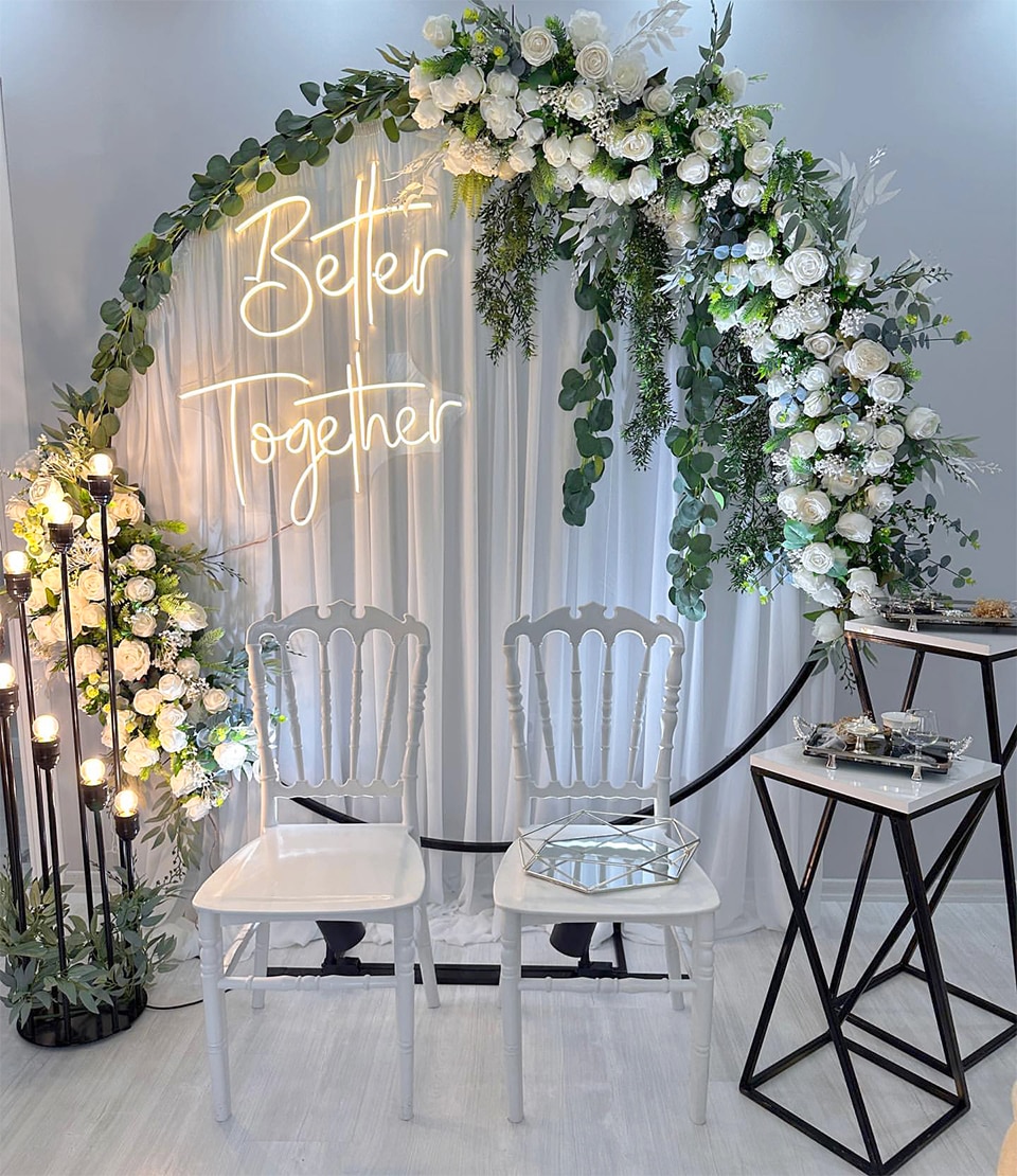 Knotting Techniques for Tying Back Drapes on a Wedding Arch