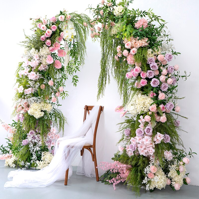 fresh flower arrangement in tall container