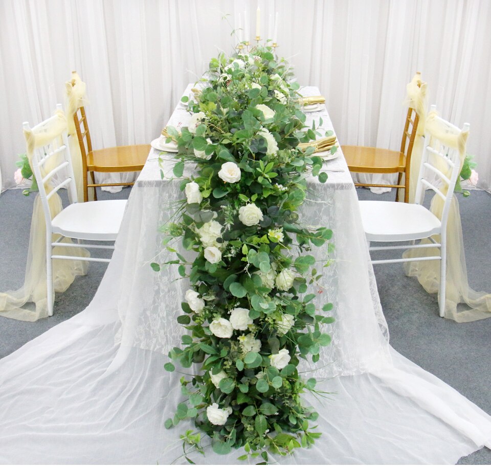 flower arrangements in ginger jars