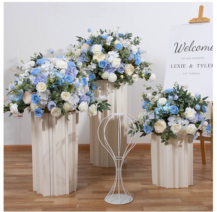 large silk flower arrangement in large pot